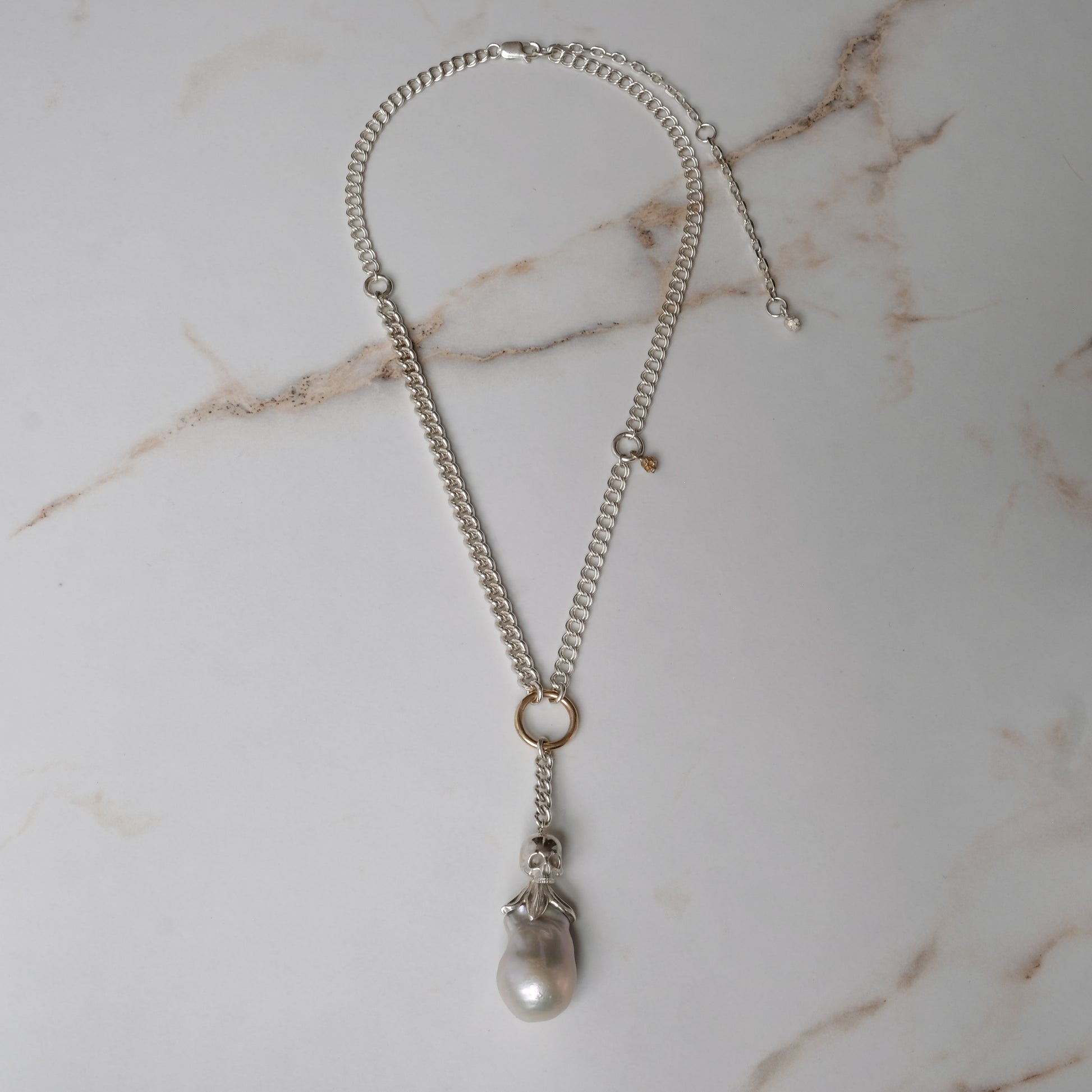 Sterling silver mix-matched curb link chain necklace with 9ct yellow gold jump ring details, old skull and hanging silver and flouish pendant with pearl. Handmade in London by Charlie Shires