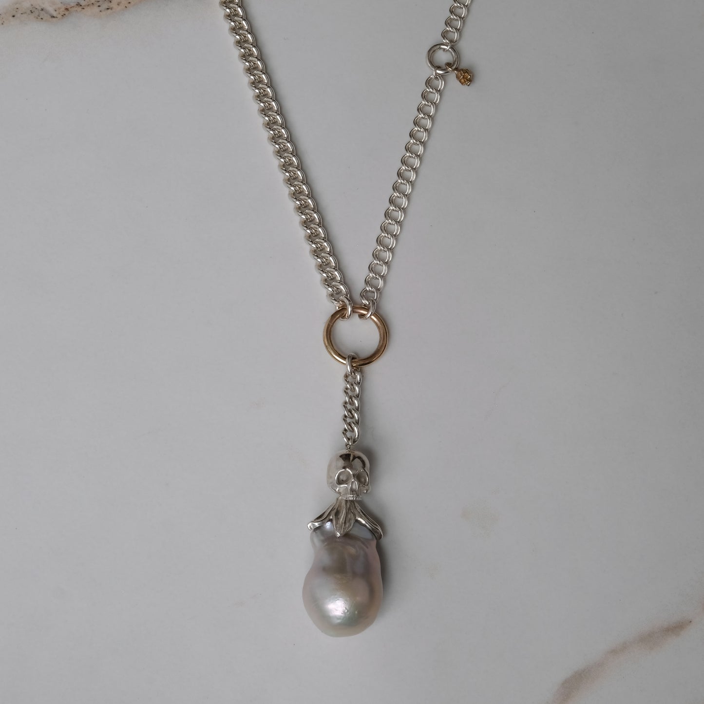 Sterling silver mix-matched curb link chain necklace with 9ct yellow gold jump ring details, old skull and hanging silver and flouish pendant with pearl. Handmade in London by Charlie Shires