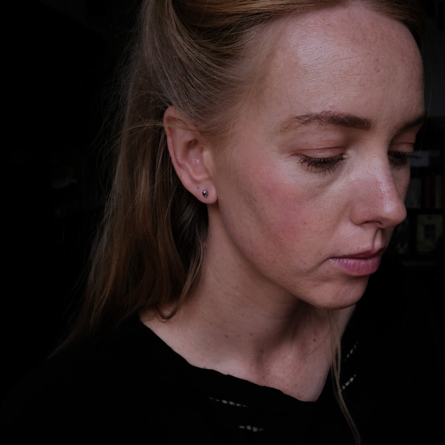 Sterling silver tiny skull studs by Charlie Shires