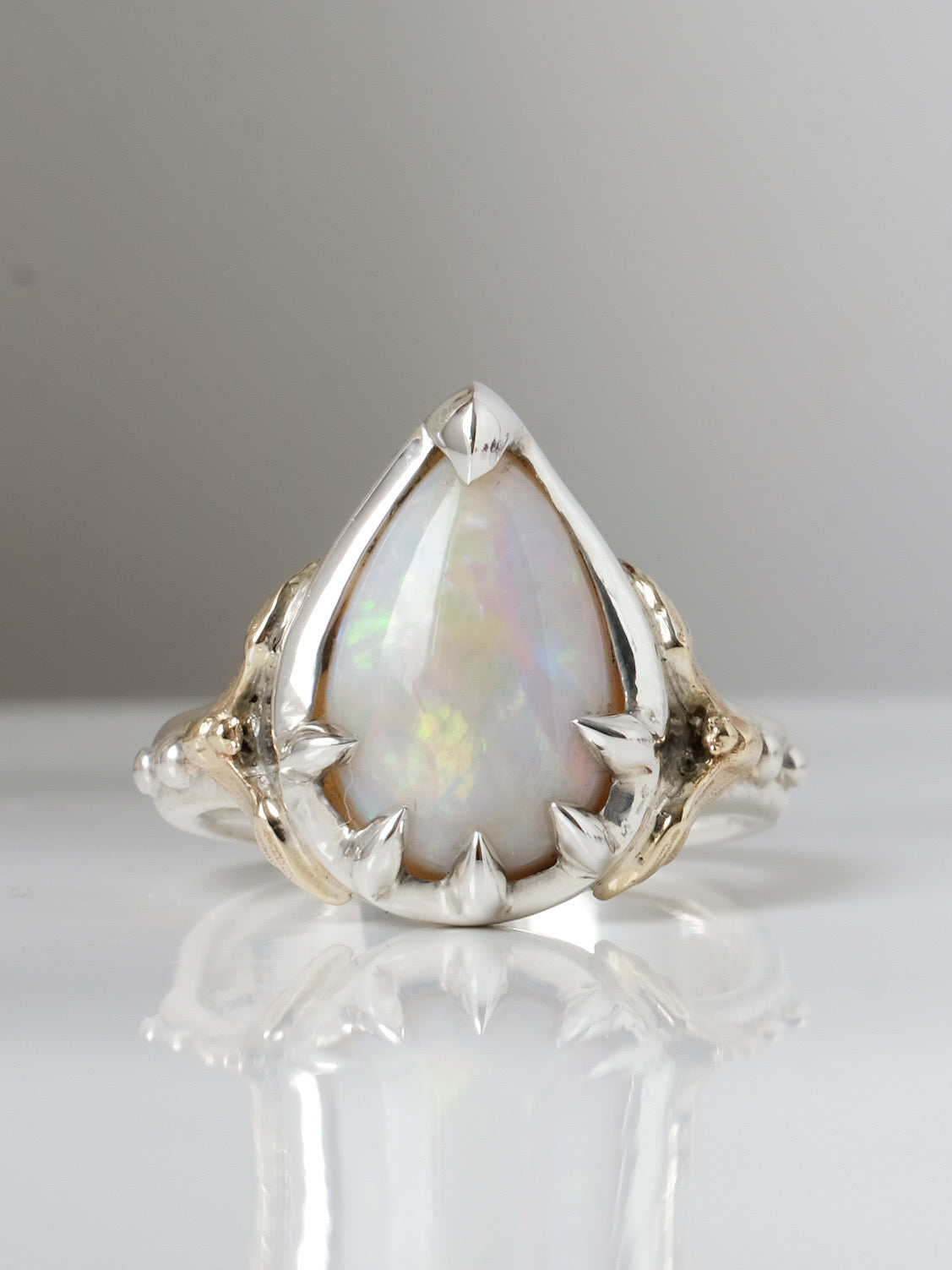 BAT and opal ring IIII