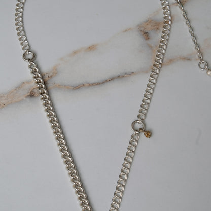Sterling silver mix-matched curb link chain necklace with 9ct yellow gold jump ring details, old skull and hanging silver and flouish pendant with pearl. Handmade in London by Charlie Shires