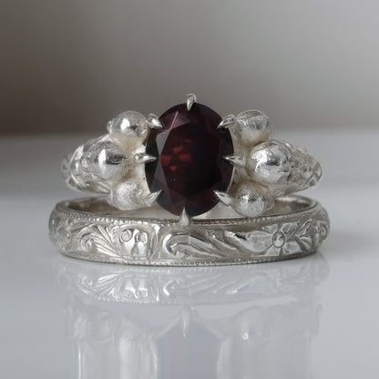 Silver band engraved with skulls, flourishes and flowers by Charlie Shires