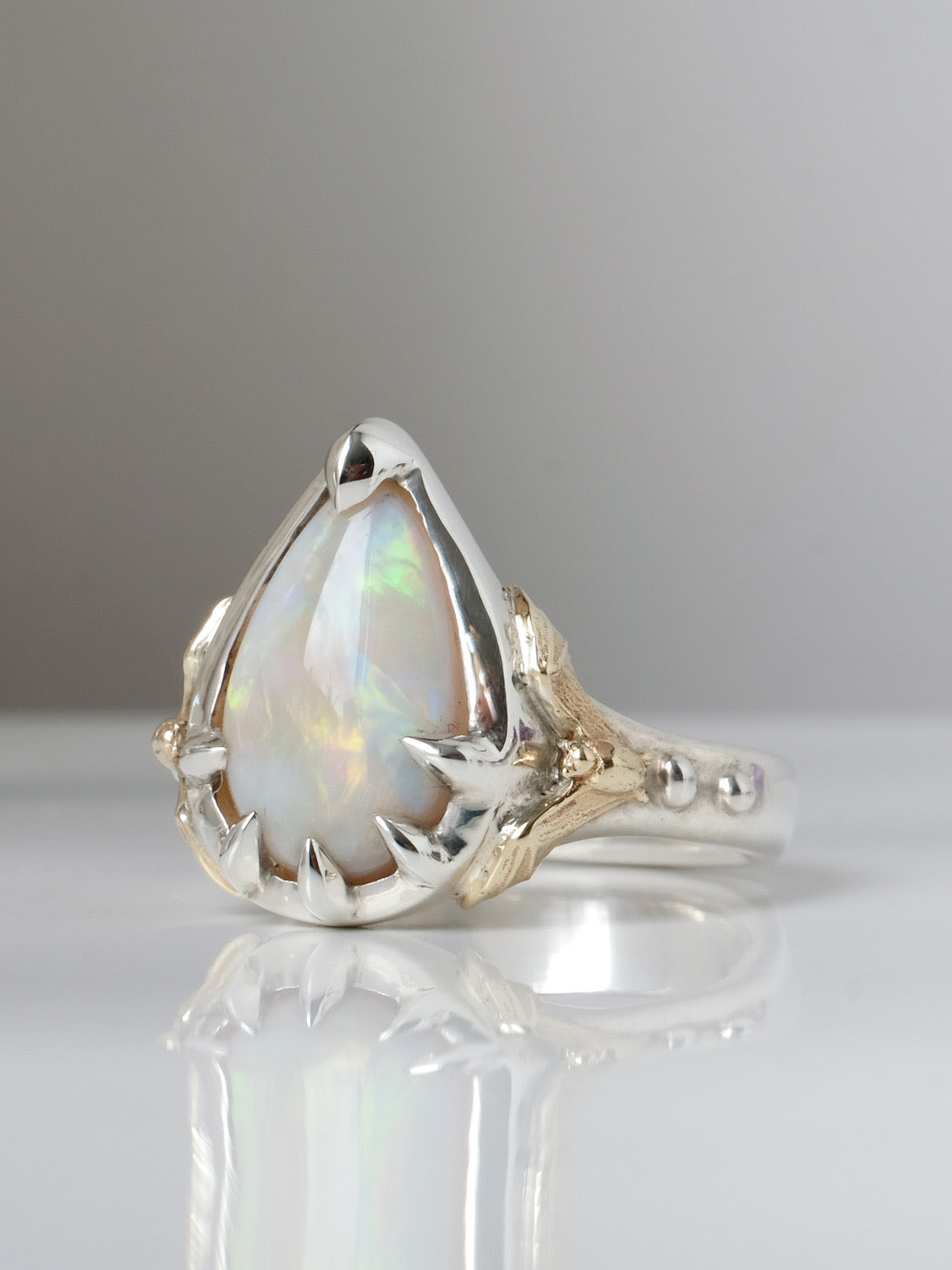 BAT and opal ring IIII