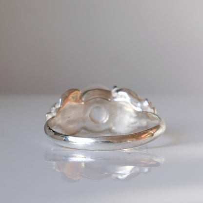 Sterling silver skull and flower pearl ring made in London by Charlie Shires