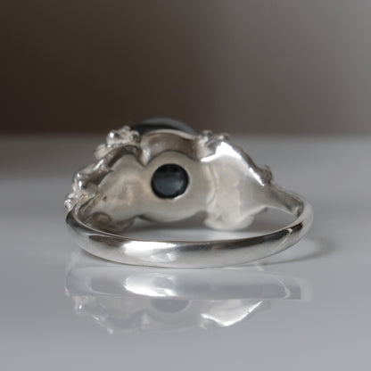 Silver skull and flower hematite ring by Charlie Shires
