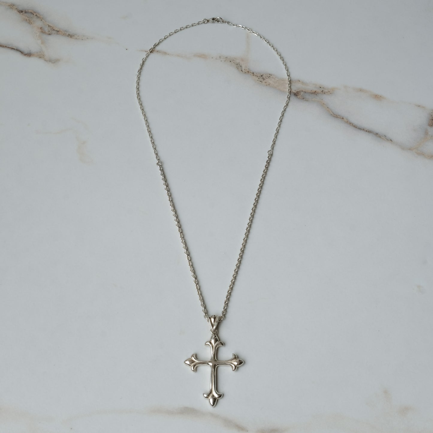 Hand carved ornate crucifix cross in sterling silver by Charlie Shires
