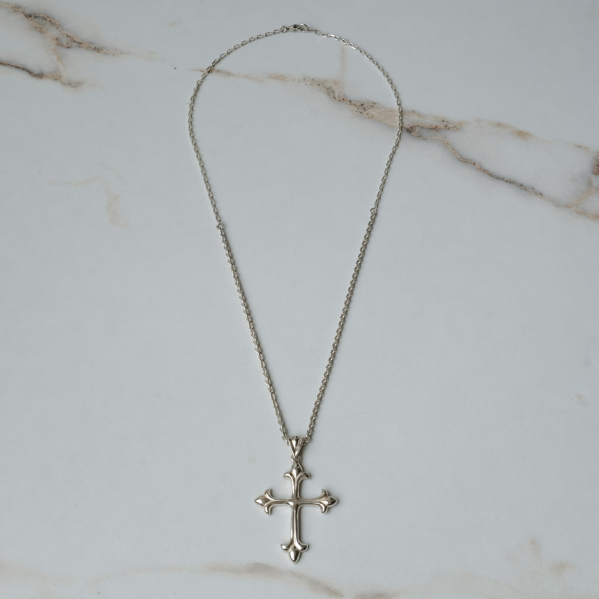 Hand carved ornate crucifix cross in sterling silver by Charlie Shires