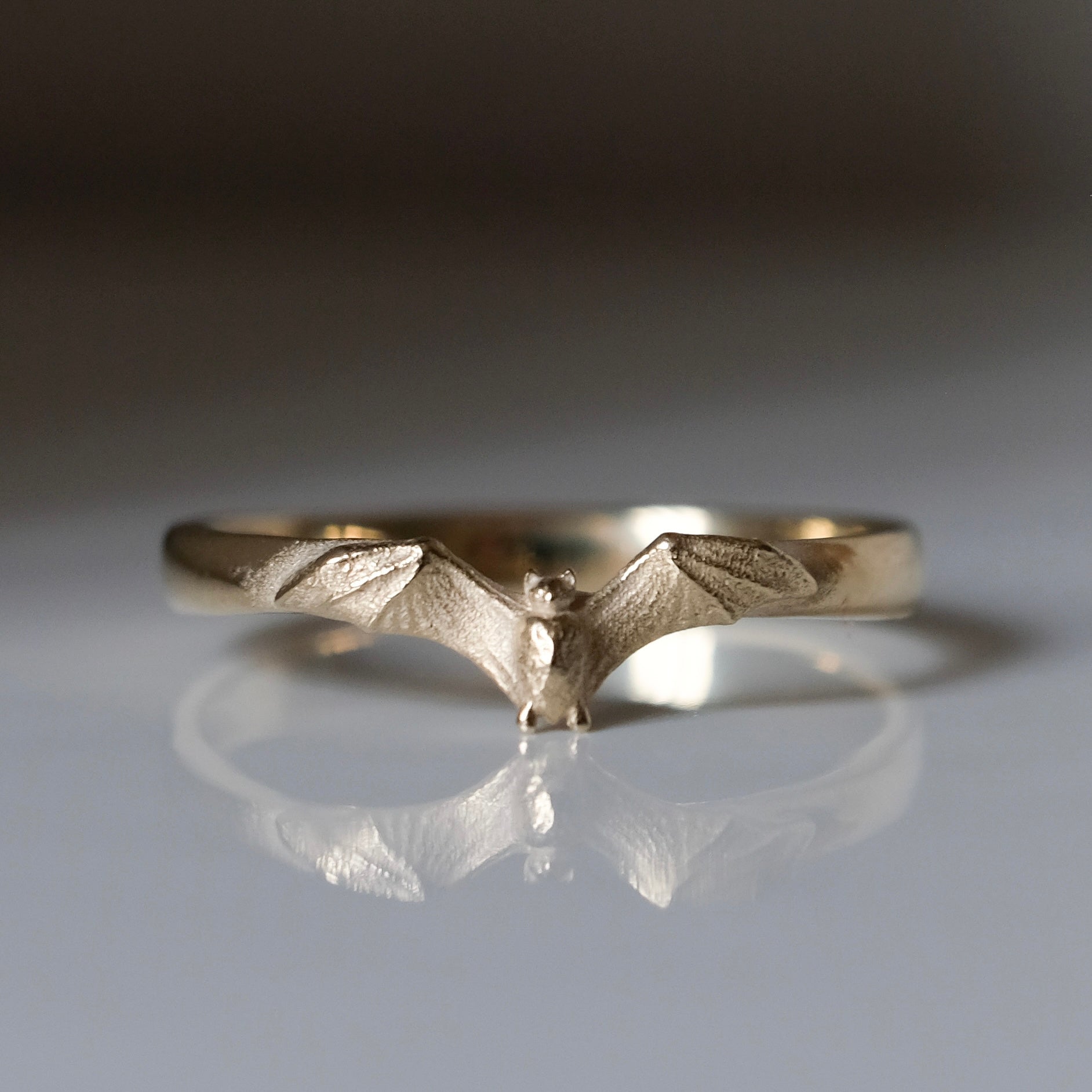 Mina bat ring in 9ct yellow gold. Handmade in London by Charlie Shires