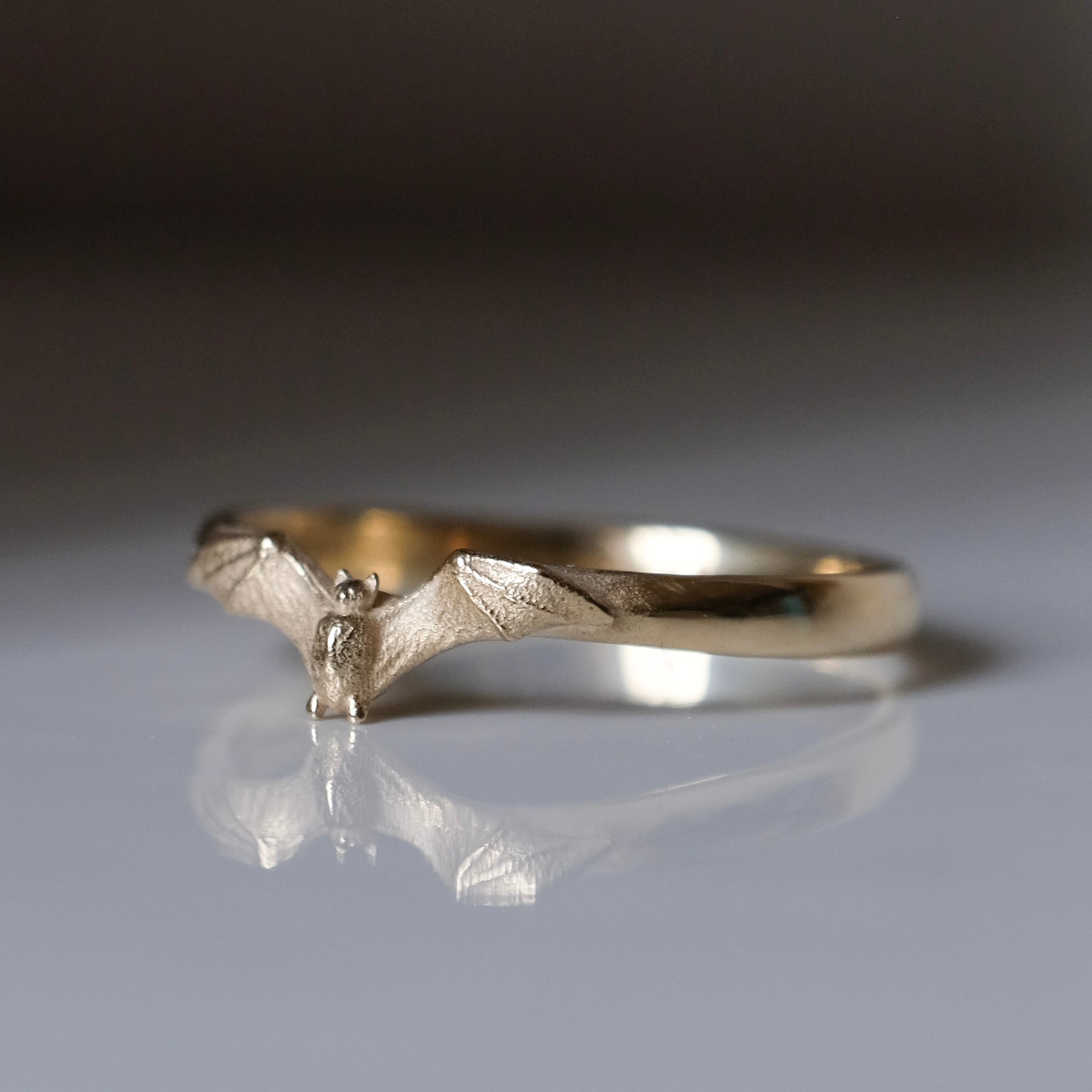 Mina bat ring in 9ct yellow gold. Handmade in London by Charlie Shires
