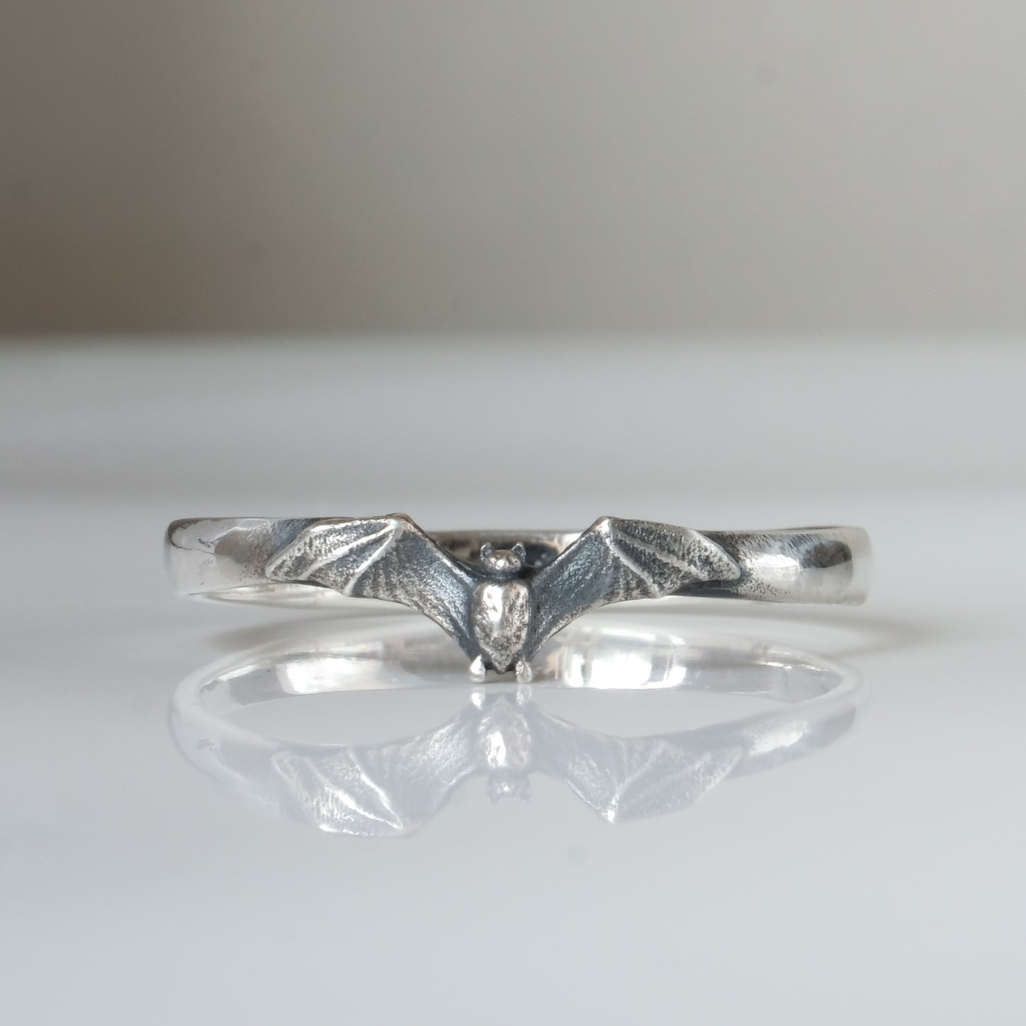 Small sterling silver bat ring by Charlie Shires in London 