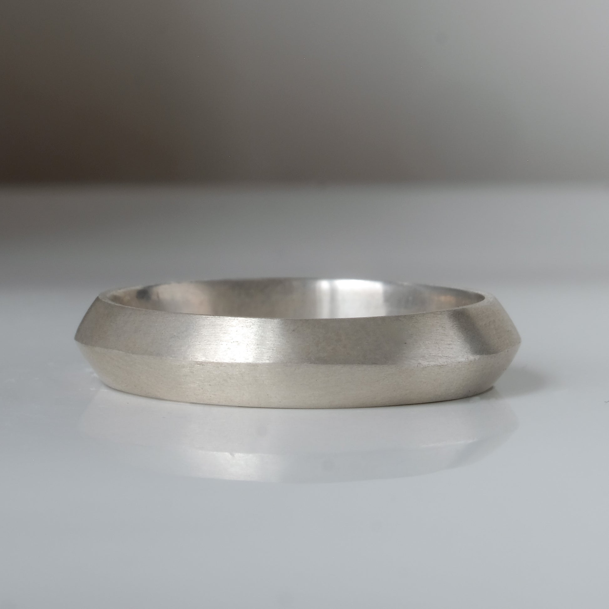Silver knife edge wedding band with matt or polished finish by Charlie Shires