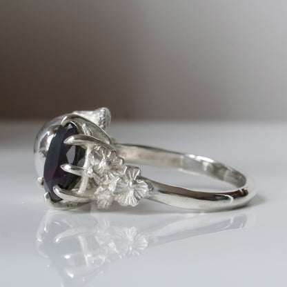 Silver skull and black opal ring with decorative flowers by Charlie Shires jewellery