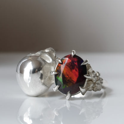 Silver skull and black opal ring with decorative flowers by Charlie Shires jewellery