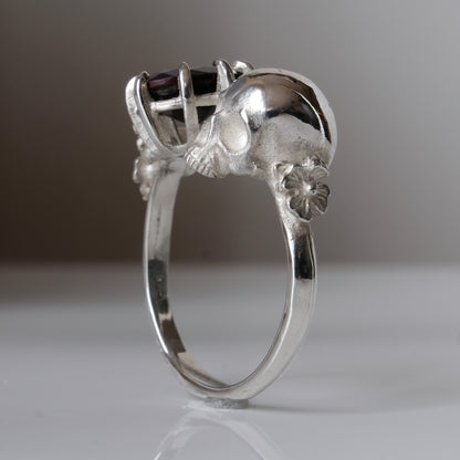 Silver skull and black opal ring with decorative flowers by Charlie Shires jewellery