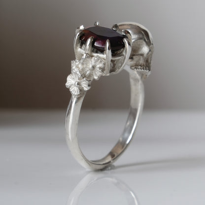 Silver skull and black opal ring with decorative flowers by Charlie Shires jewellery
