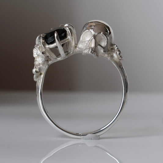 Silver skull and black spinel ring with decorative flowers by Charlie Shires jewellery
