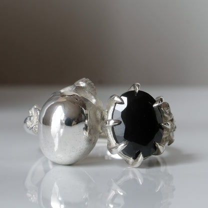 Silver skull and black spinel ring with decorative flowers by Charlie Shires jewellery
