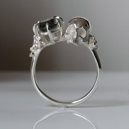 Silver skull and synthetic tourmaline ring with decorative flowers