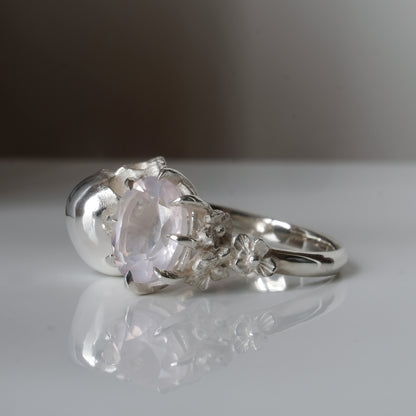Silver skull and rose quartz ring with decorative flowers