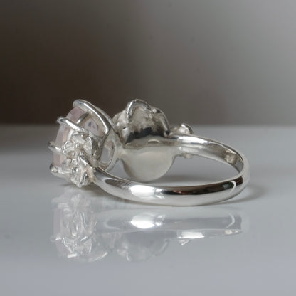Silver skull and rose quartz ring with decorative flowers