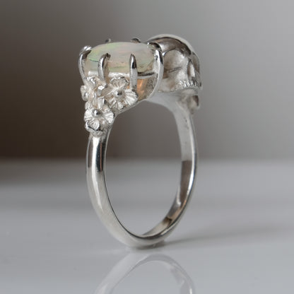 Silver skull and white opal ring with decorative flowers